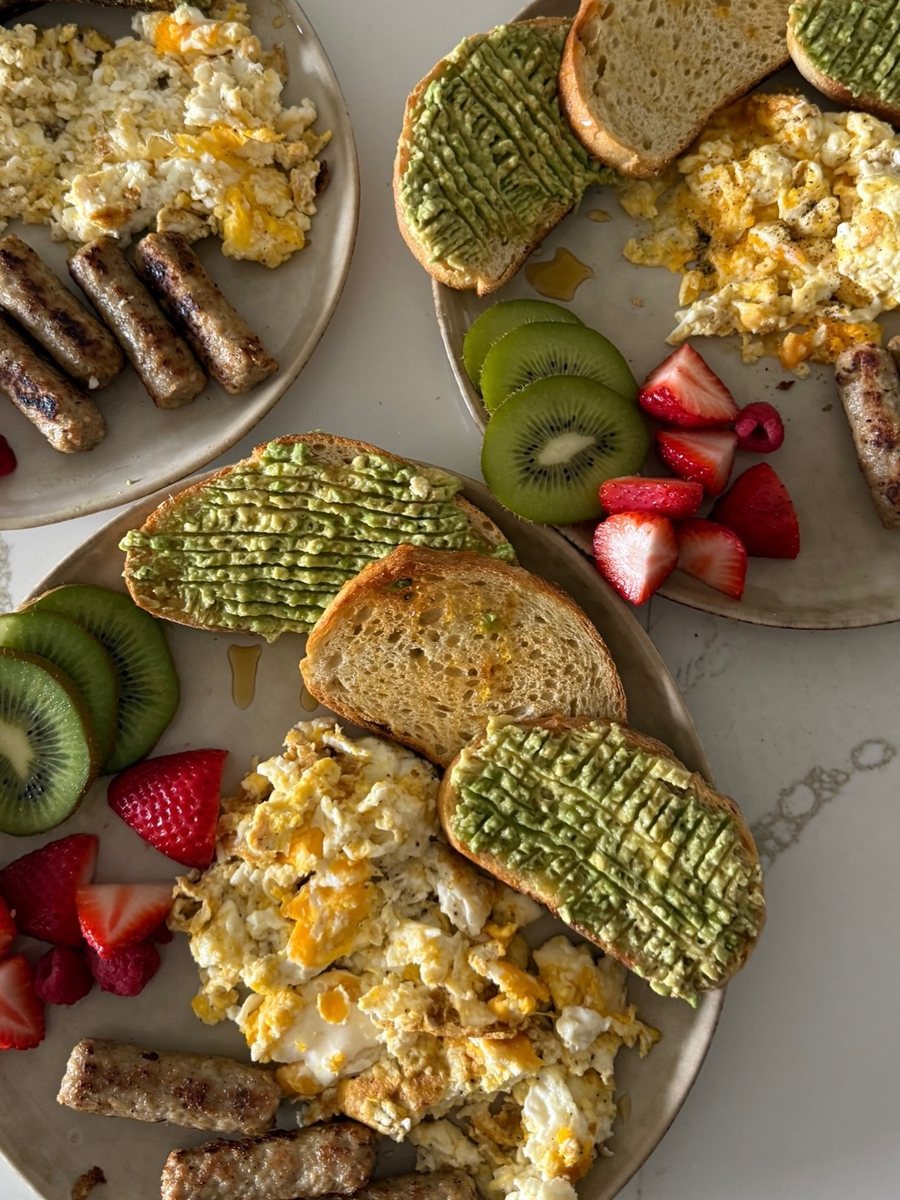 Eggs, sourdough, sausage and fruit — a REAL breakfast