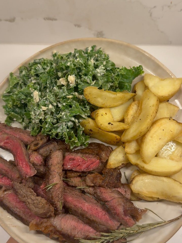 Steak, potatoes and a kale salad